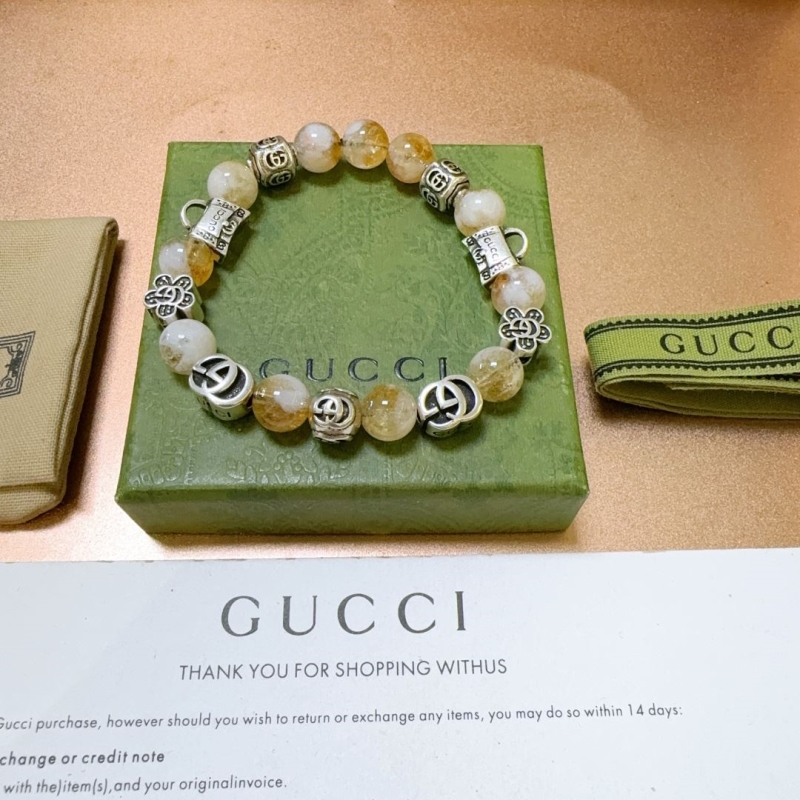 G*u*i bracelets